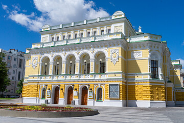 Fototapeta premium Ornate Yellow Historic Theater Building Facade