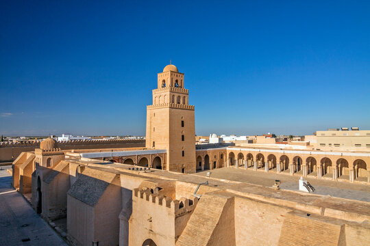 The panoramic view of fortress-like Great Mosque aka the Mosque of Sidi-Uqba and its minaret (built 9th century) are listed as UNESCO World Heritage. Kairouan, Tunisia