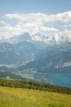 Panoramic summer view of Lake Thun and Jungfrau