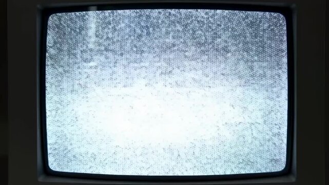 Static noise on vintage television screen. Represents the disruption of communication and nostalgia for retro media experiences