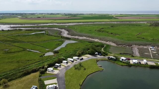 Wide Aerial Flyover of Riverside Caravan and Camping Park