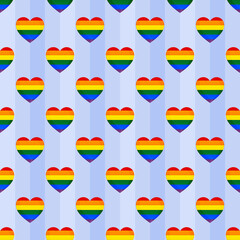 Seamless pride heart pattern with rainbow colors on light blue stripes. LGBTQ+ pride month background for love and equality. Repeating hearts wallpaper for greeting cards and textile design.
