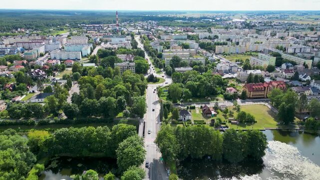 Aerial drone video with Marconi roundabout in Augustow city on the Netta River and Augustow Canal, Poland