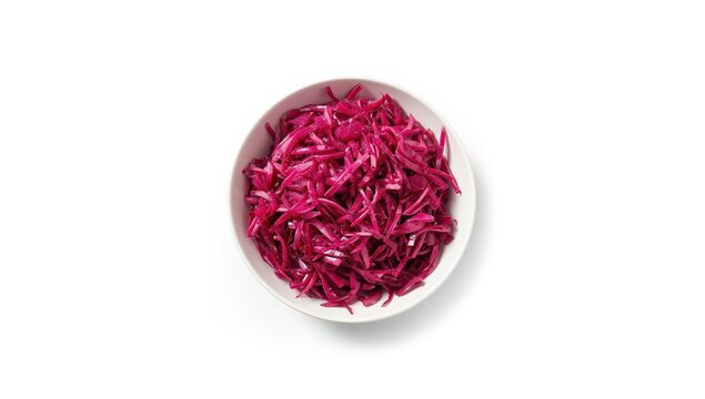 Top view of a bowl of flavorful red cabbage sauerkraut on white background