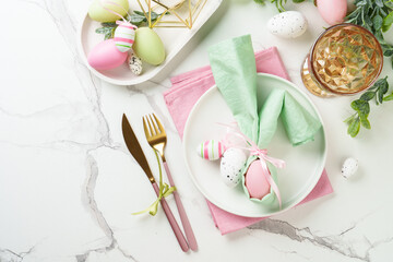 Easter food or table setting on white background.