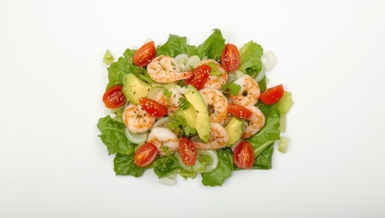 Top view of shrimp salad featuring avocado, cherry tomatoes, green leaf mix, and sesame seeds against a white backdrop