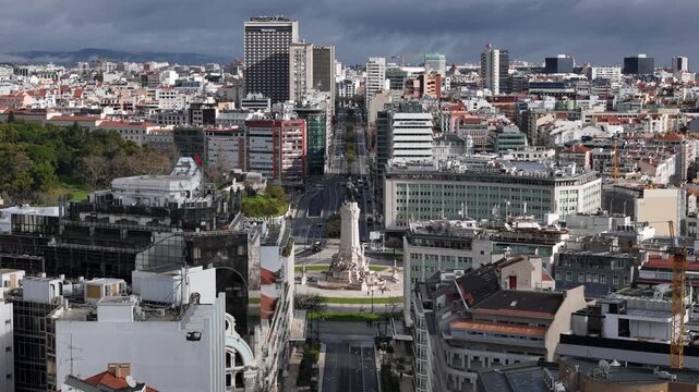 Aerial view of the Marques de Pombal statue standing tall amidst the bustling city, framed by buildings and avenues, Lisbon, Lisbon, Portugal.