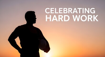 Silhouette of a construction worker holding a hard hat against a vibrant sunset sky, celebrating hard work and dedication