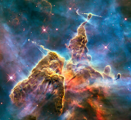 Mystic Mountain in Carina Nebula Captured by Hubble Space Telescope. Elements of this image furnished by NASA. © gizemg