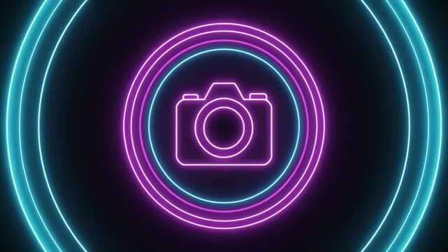 Neon camera icon centered within glowing cyan and magenta concentric circles on black symbol outline