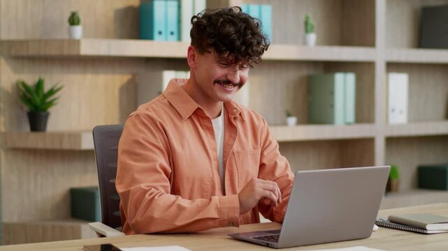 Caucasian business man typing laptop reading good news smiling satisfied businessman look in computer male guy rejoice surprised smile with online internet notification job successful chat in office