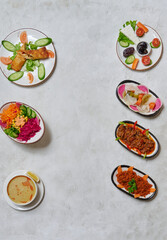 Abundant Ramadan table with mixed grill, lentil soup, fresh salads, and traditional Turkish dishes served elegantly.