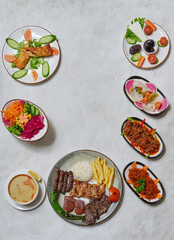 Abundant Ramadan table with mixed grill, lentil soup, fresh salads, and traditional Turkish dishes served elegantly.