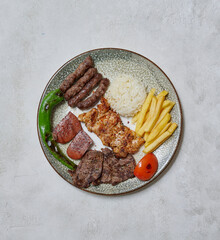 Abundant Ramadan table with mixed grill, lentil soup, fresh salads, and traditional Turkish dishes served elegantly.