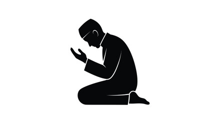 A man kneeling in prayer a striking black silhouette © mst