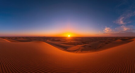 Golden sun setting over vast desert sand dunes