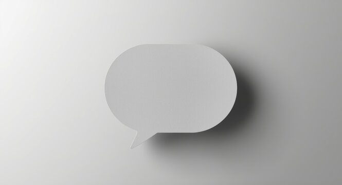 Speech bubble in gray tone over minimalistic background conveying social media interaction