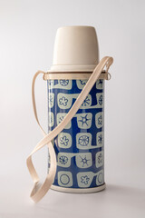 Vintage Vacuum Flask with Plastic Cup Cover, Isolated On White Background