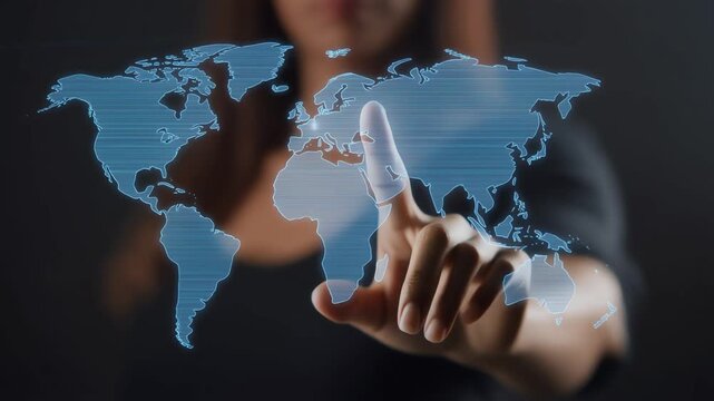 woman touching transparent digital world map interface