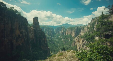 Wide natural scene highlighting towering cliffs