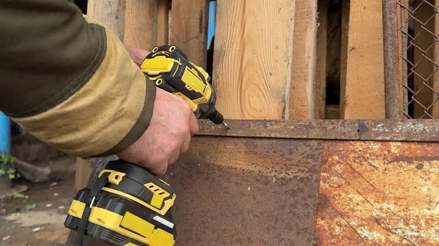cordless impact wrench with thread tap bit tap thread into metal door side angle