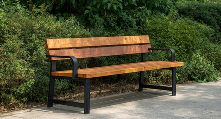 Fototapeta premium Modern design outdoor bench blending solid wood and metal near rich green park vegetation