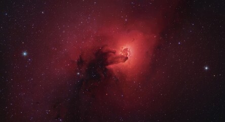Naklejka premium Red shaded interstellar nebula with dark starry sky background