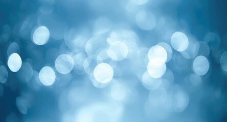 Obraz premium Soft bokeh illuminated blue background perfect for Christmas greeting cards