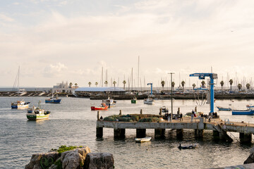 Fishing boats moored at Cascais marina pier
