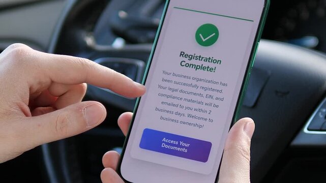 Close up of user finishing company registration via mobile app and accessing official documents. Seamless digital onboarding, compliance approval and secure account activation. Ideal for corporate