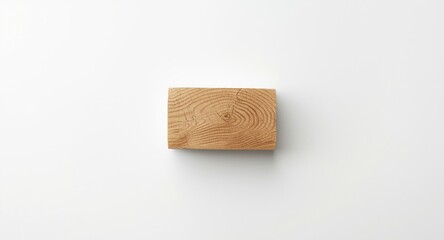 Fototapeta premium White surface accentuating the natural character of a rectangular shaped hardwood log