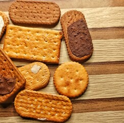 Assorted Crackers on Wooden Background