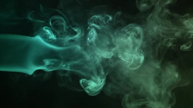 Colorful Smoke Clouds on Dark Background.