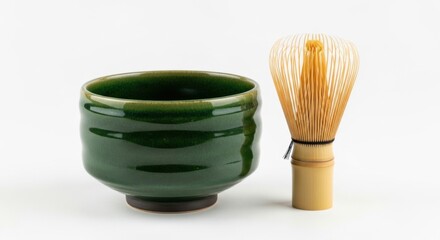 Green Ceramic Bowl with Bamboo Whisk on White Background
