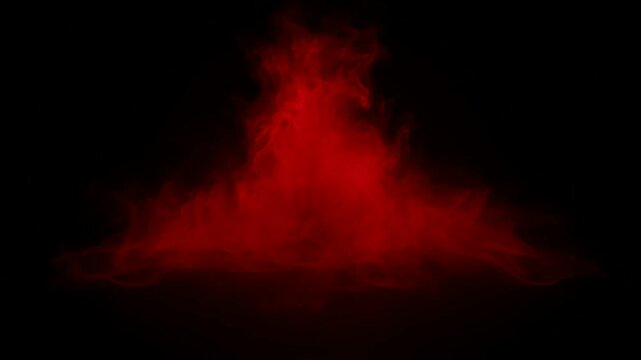 A vibrant red smoke cloud rises dramatically against a transparent dark background viewed from a low angle