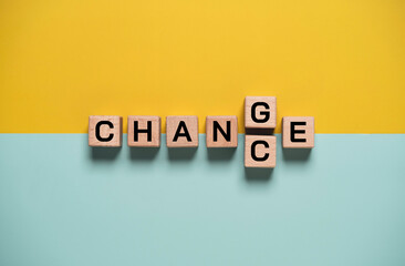 Change and chance concept with wooden letter blocks on colorful background. Business transformation, opportunity mindset and strategic decision making theme symbolizing growth and new possibilities.