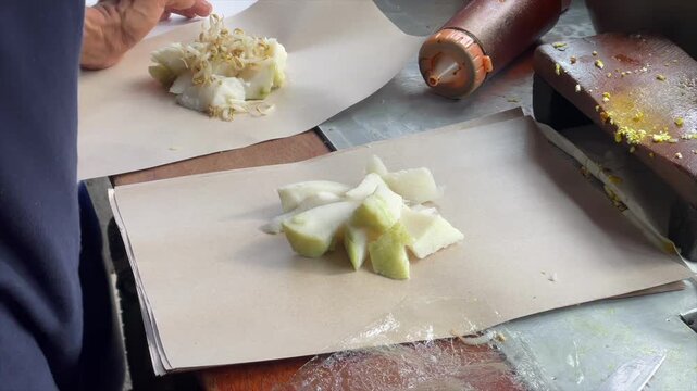 Preparing kupat tahu or indonesian traditional rice cake with yellow tofu and bean sprouts