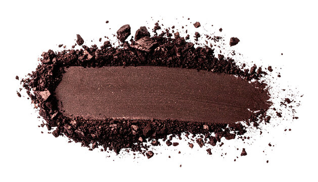 Smudged, rectangular swatch of dark brown, shimmery pigment with surrounding fragments