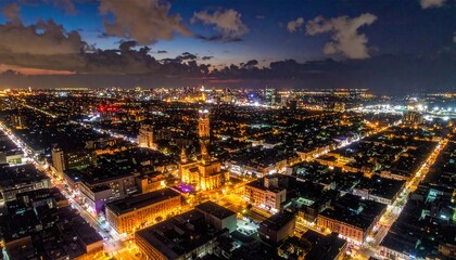 Obraz premium Cityscape at Dusk Illuminated Skyscrapers Urban Nightlife.