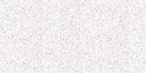 Close up of a textured speckled surface with neutral tones