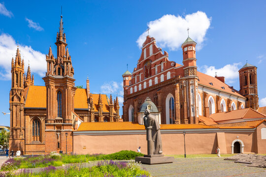 A Statue of the Polish Poet Adam Mickiewicz in front of St. Anne's Church and the Church of St. Francis and St. Bernard, Vilnius, Lithuania