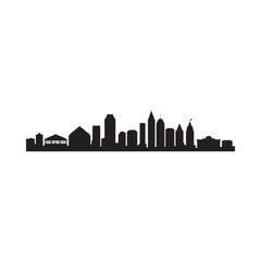 Fototapeta premium Silhouetted cityscape showcases a modern skyline with diverse building heights