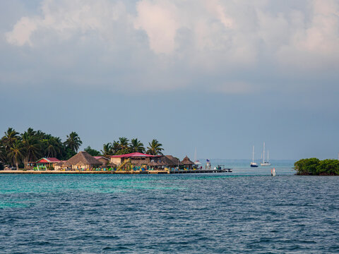 View towards The Lazy Lizard Bar and The Split at sunrise, Caye Caulker, Belize District, Belize