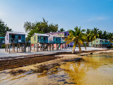 Traditional stilt houses at the waterfront of Caye Caulker, Belize District, Belize