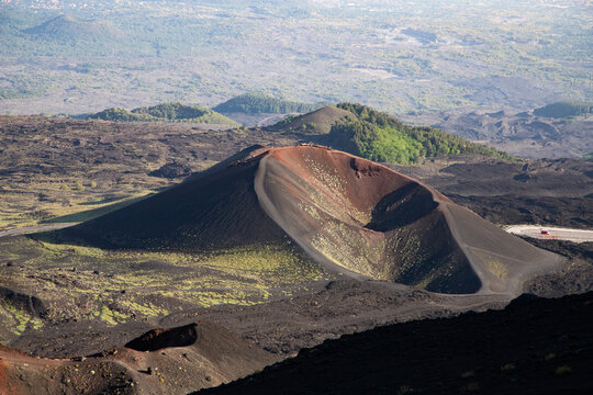 Exploring the unique landscape of Etna volcano in Sicily with its distinct Martian-like features and rocky terrain