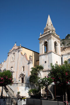 Exploring the historic architecture of Taormina in Sicily with its old buildings and clear blue sky