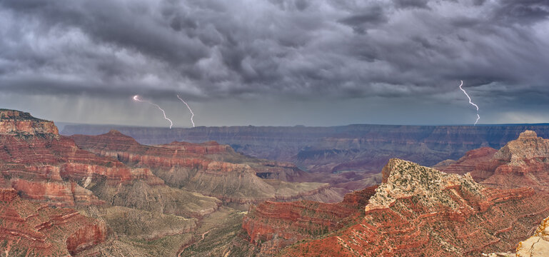 Panorama of a lightning storm passing over Grand Canyon Arizona, viewed from Cape Royal on the North Rim