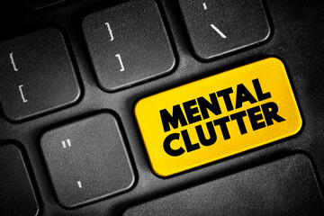 Fototapeta premium Mental Clutter - takes up space in our brain, but continues to live rent-free as we feed and otherwise sustain it, text button on keyboard, concept background