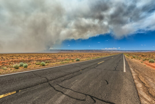 Smoke from the Dragon Bravo Wildfire burning on Grand Canyon North Rim billowing off the Kaibab Plateau, United States