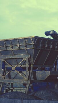 industrial skyline with silos and conveyors, postindustrial aesthetic, cloudy sky, weathered metal, distant rooftops, quiet morning atmosphere, adaptive reuse